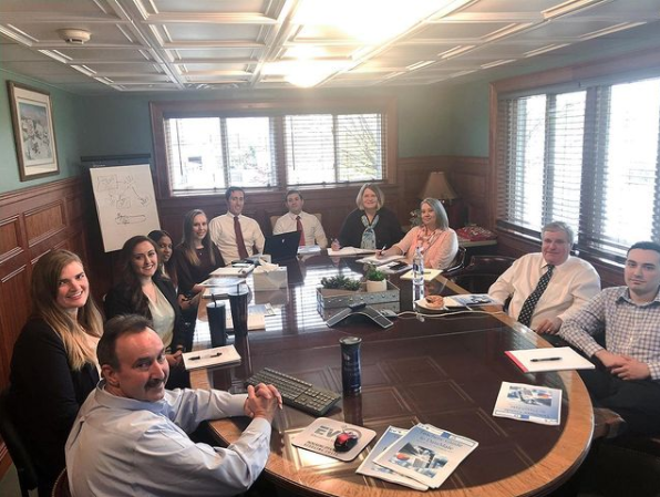 Staff picture Staff picture in conference room